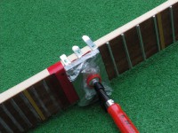 Frets bonding pressure